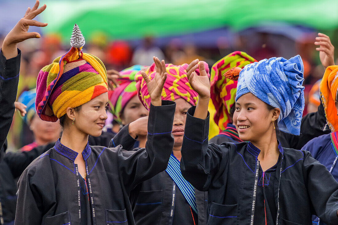 Tribal young women with colourful head coverings; Yawngshwe, Shan State, Myanmar
