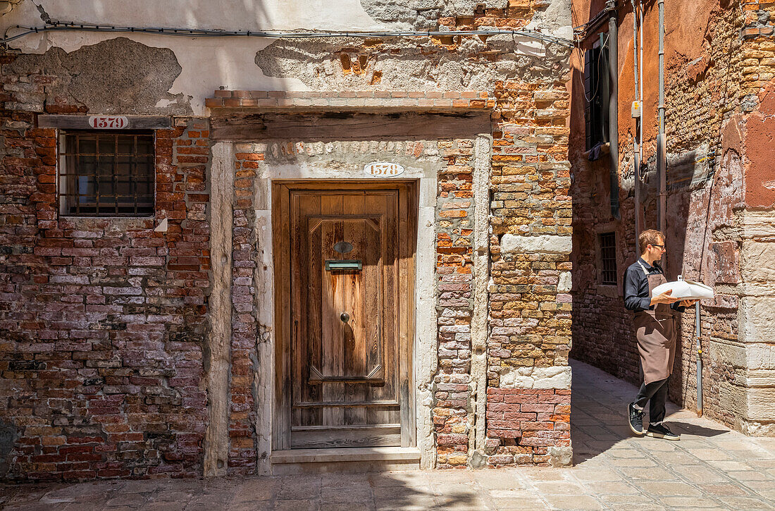 Delivering pastries; Venice, Italy