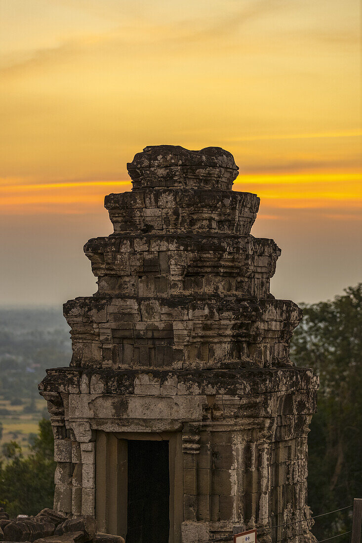 Sunset at Phnom Bakheng Temple in the Angkor Wat complex; Siem Reap, Cambodia