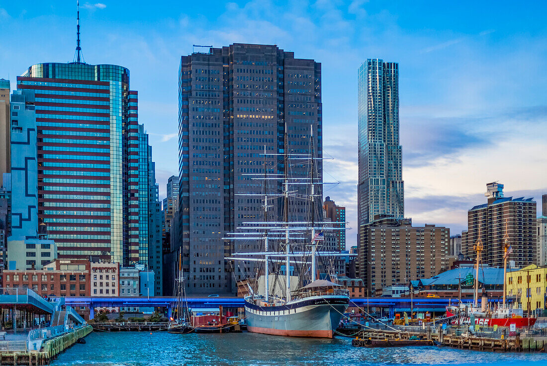 Boats in the harbour and skyscrapers in Manhattan; New York City, New York, United States of America