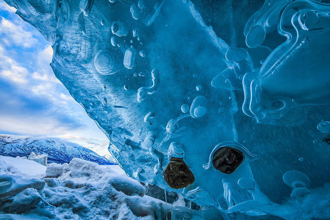 Crushed ice takes on beautiful patterns and shapes along the shoreline of Kluane National Park; Yukon, Canada