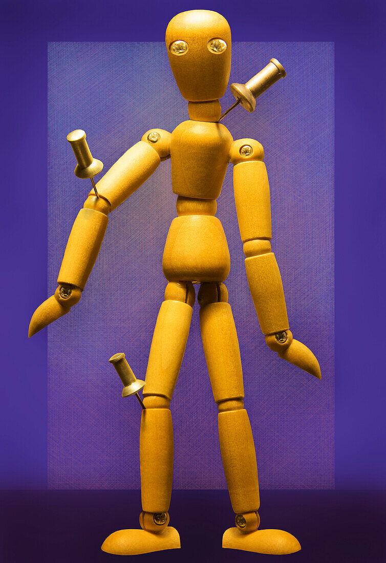Wooden Figure with Pushpins in Joints