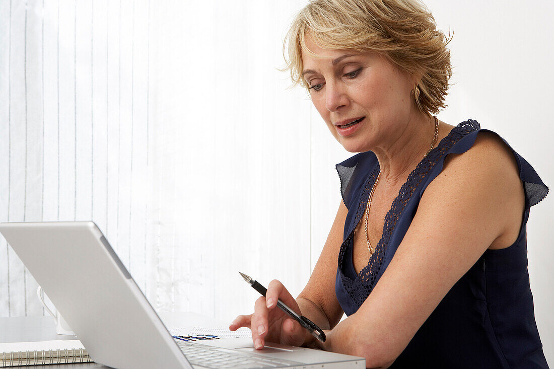 Woman Using Laptop