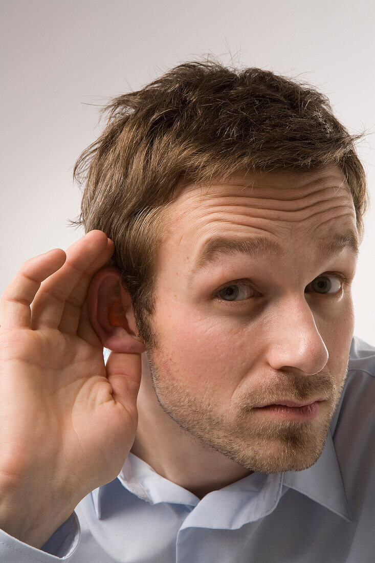 Portrait of Man Cupping Ear