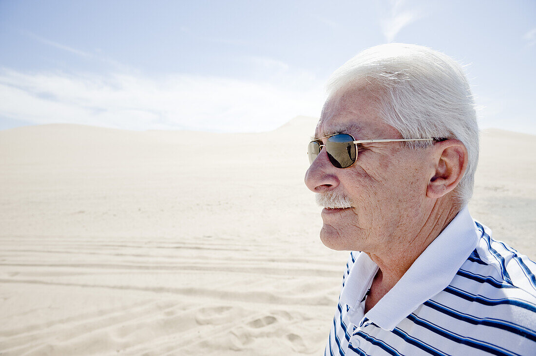 Portrait of Man in the Desert, Imperial Sand Dunes Recreation Area, California, USA