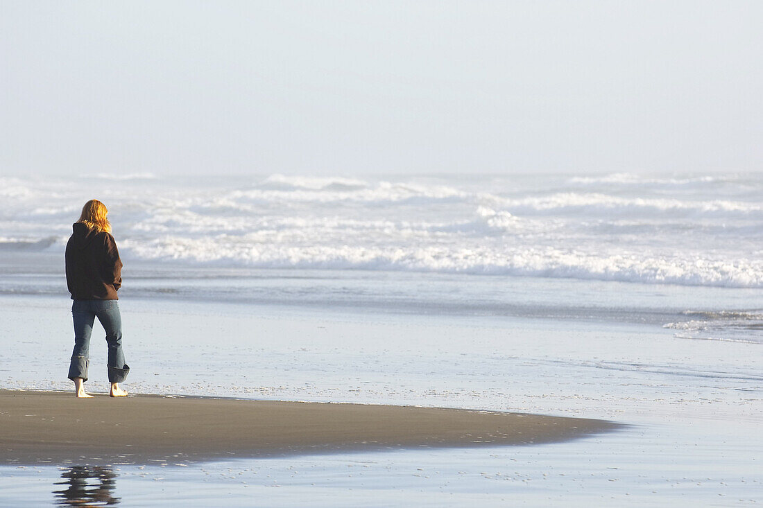 Woman Walking on Beach, Humboldt Coast, California, USA