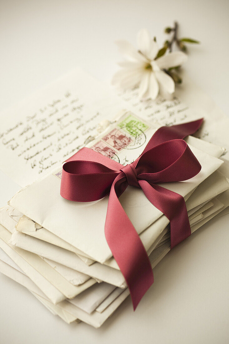 Stack of Letters Tied With Ribbon