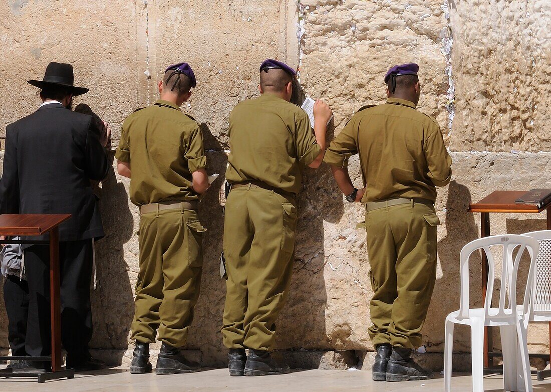 Soldiers Praying At The Western Wall; Jerusalem, Israel