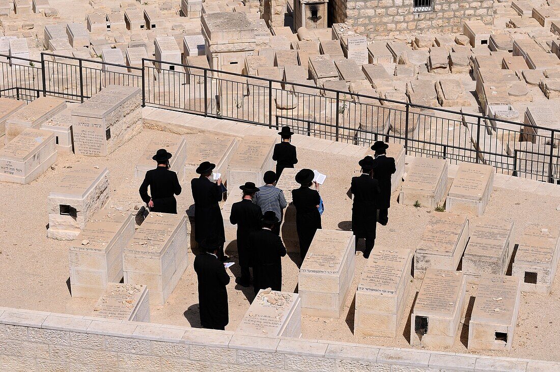 Prayer At Gravesite On Mt Of Olives; Jerusalem, Israel