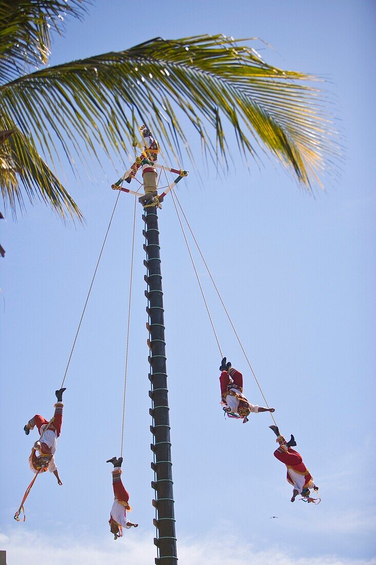 Papantla Fliers From Veracruz Performing Folkloric Show; Golden Zone, Mazatlan, Sinaloa, Mexico