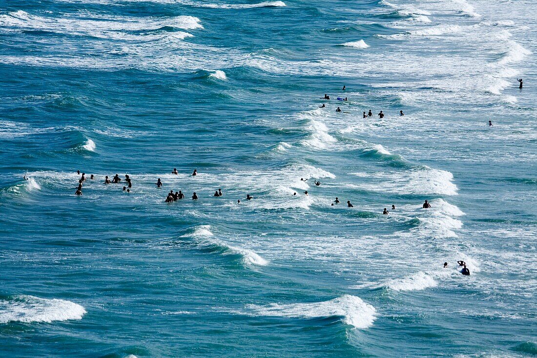 High Angle View Of People Swimming In Sea; Cocoa Beach, Florida, Usa