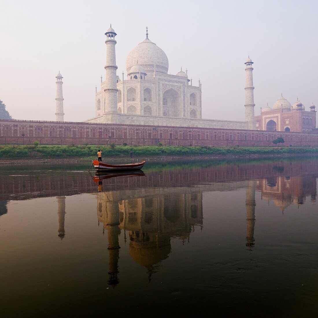 Person In Boat In Front Of Taj Mahal; Agra, India