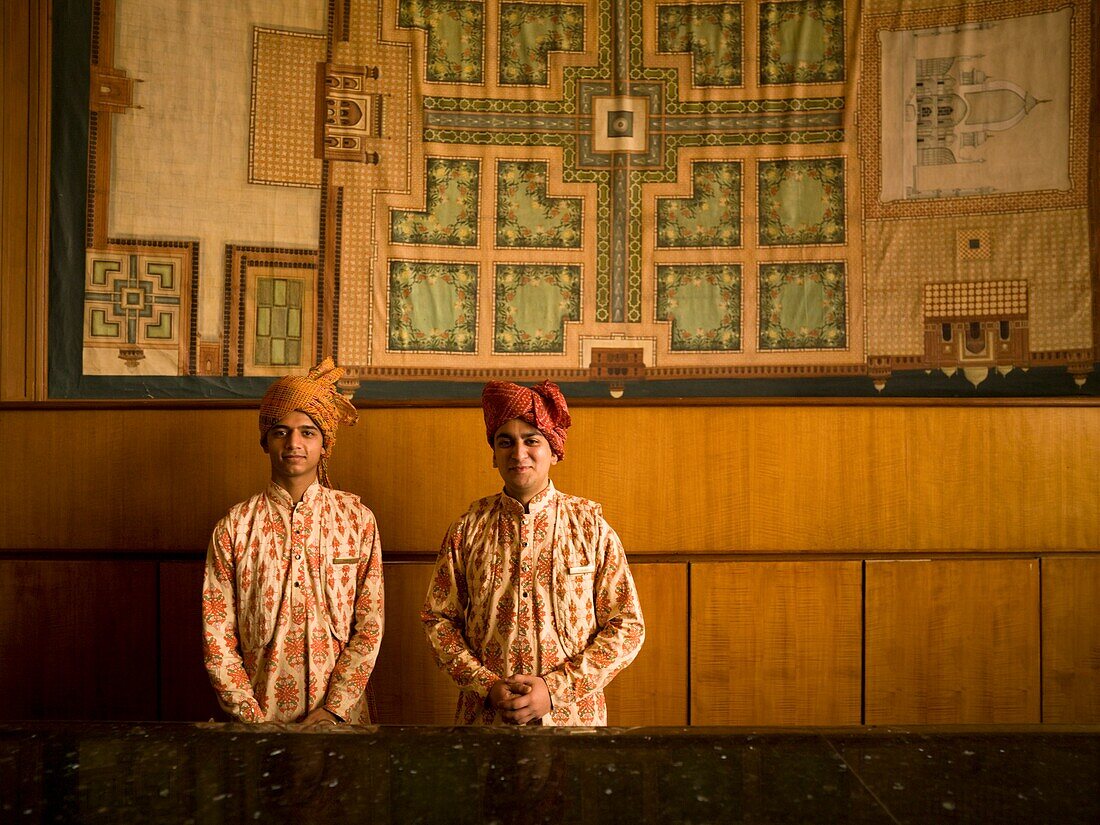 Two Men Standing In Front Of Wall; Agra, India