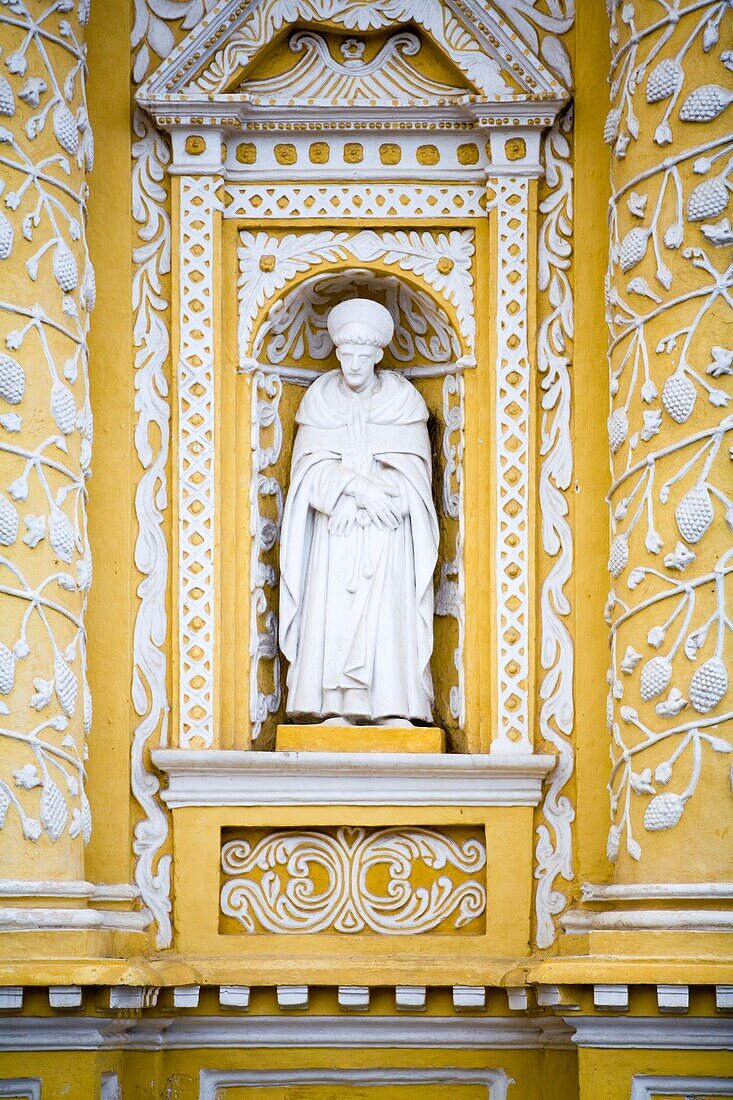 Architectural Detail Of Church's Facade, Statue Of Saint; Antigua, Guatemala