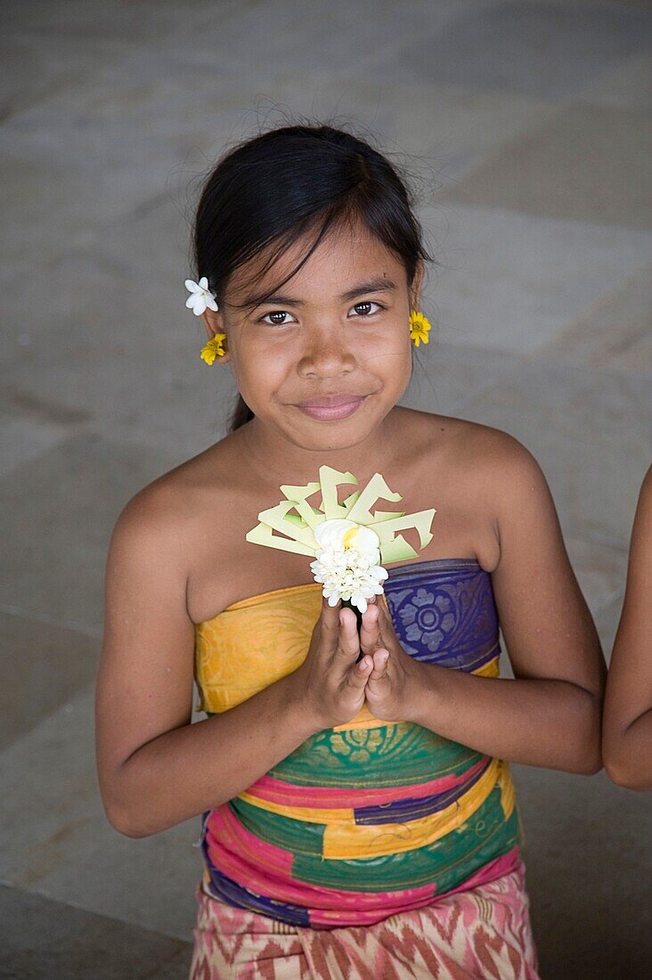 Asian Girl Offering Flowers