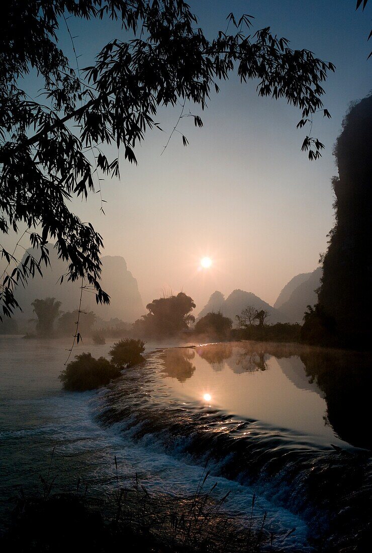 Frozen Pond In Mountain Area; Yulong River, Yangshuo, China