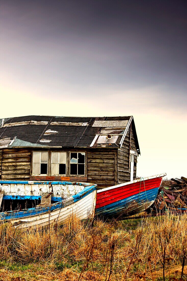 Abandoned Hut And Fishing Boats