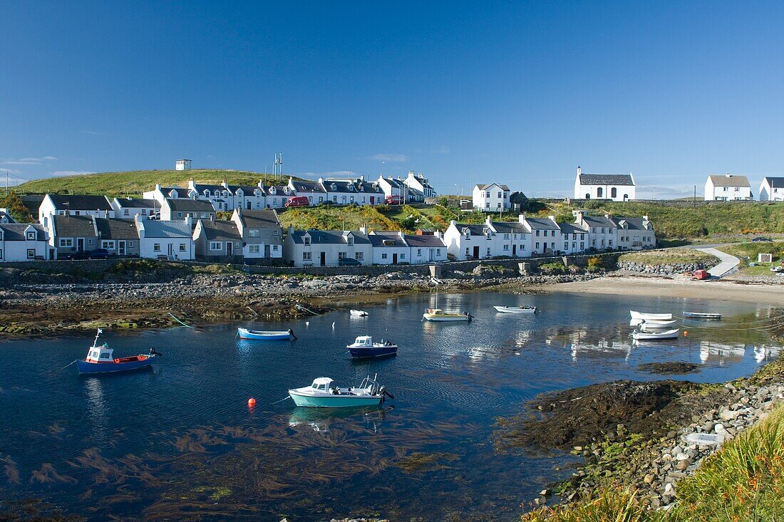 Small Boats In The Water Near Houses