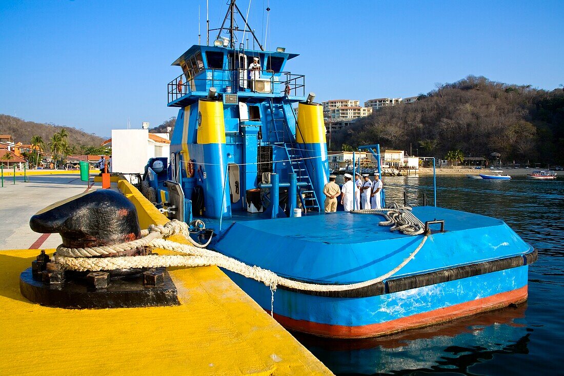 Santa Cruz Port, Huatulco, Oaxaca State, Mexico; Mexican Navy Tugboat Moored By Dock