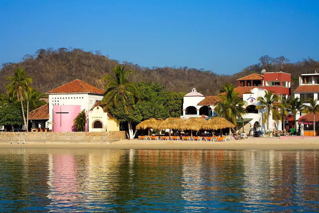 Santa Cruz Beach, Huatulco, Oaxaca State, Mexico; Waterfront Cafe On Beach