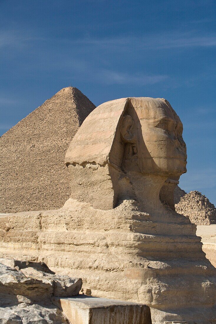 The Sphinx With The Pyramid In Background