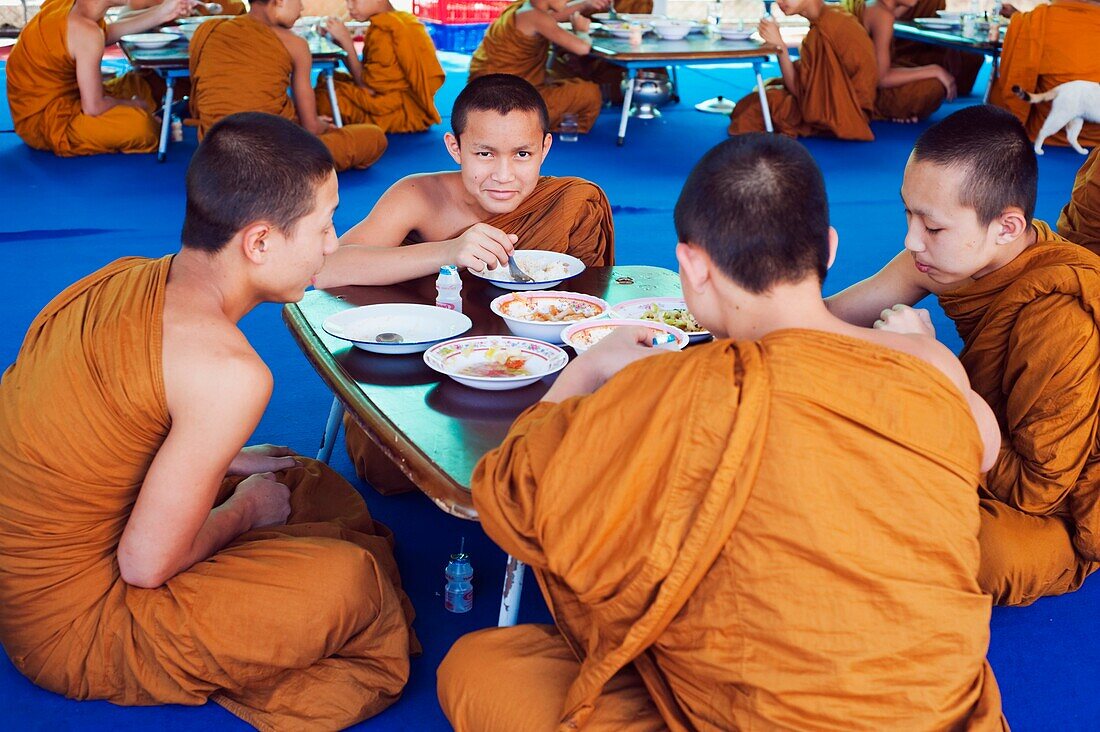 Buddhist Monks Eating In Thailand