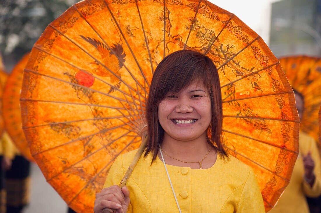 Woman With Parasol In Flower Festival, Chiang Mai, Thailand