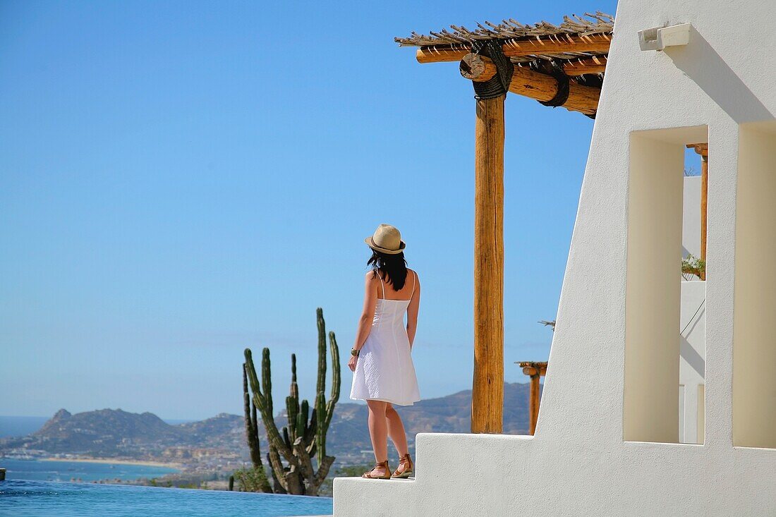 Woman Standing On Terrace, Cabo San Lucas, Mexico