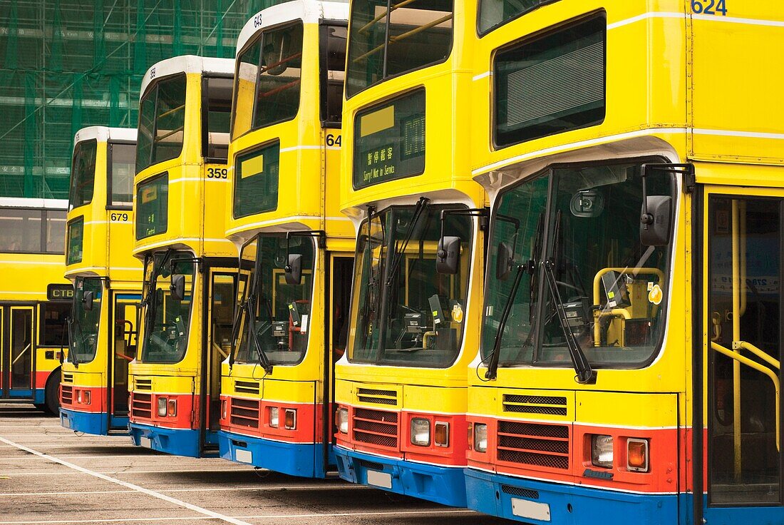 Row Of Colorful Buses In Hong Kong; Hong Kong, China