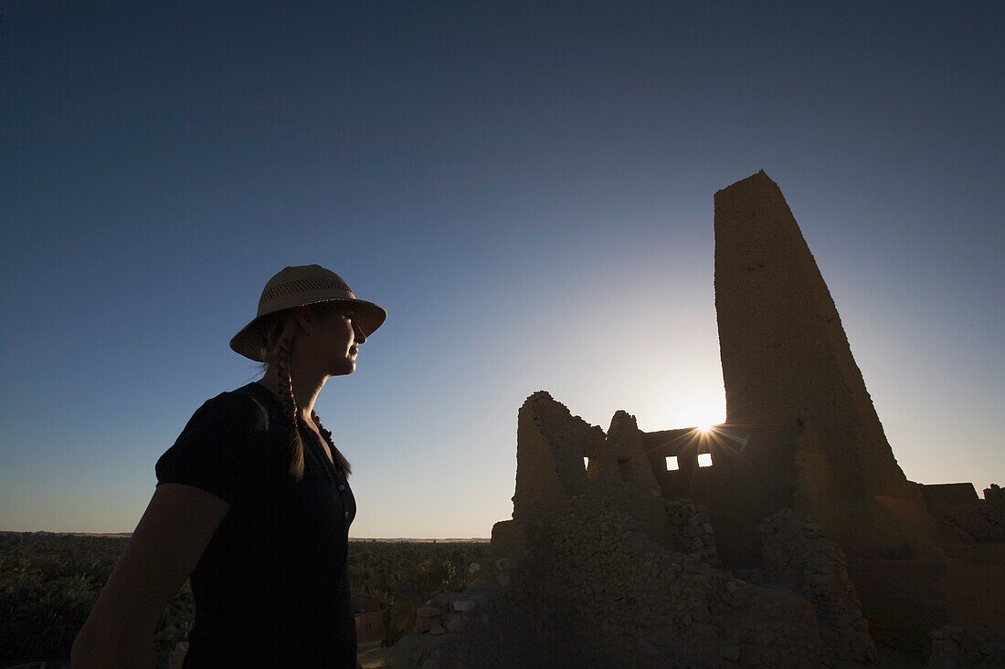 Woman Tourist At The Temple Of The Oracle (Temple Of Amun), Siwa Oasis, Egypt