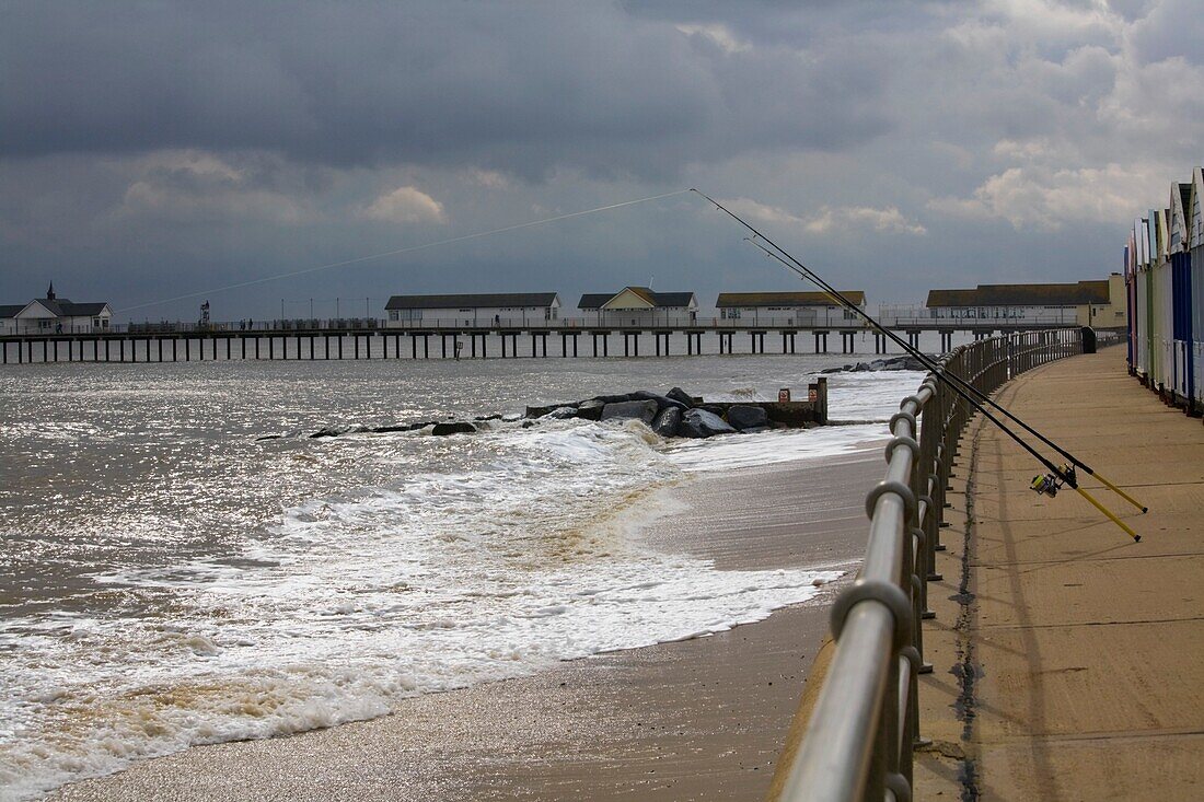 Suffolk, England; Fishing Rods Hanging Off The Pier On The Coast Of The North Sea