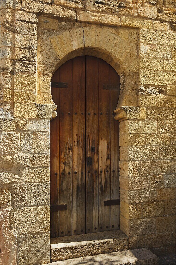 Old Weathered Wooden Door With Moorish Stone Arch, Ronda, Spain