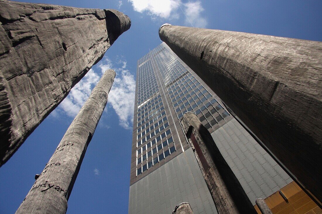 Low Angle View Of Sculptures And Skyscrapers