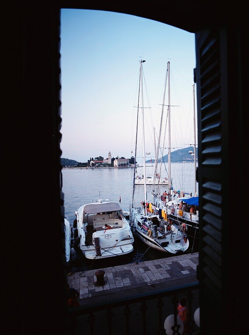 Looking Out Of Window At Dawn Towards The Church Of Our Lady