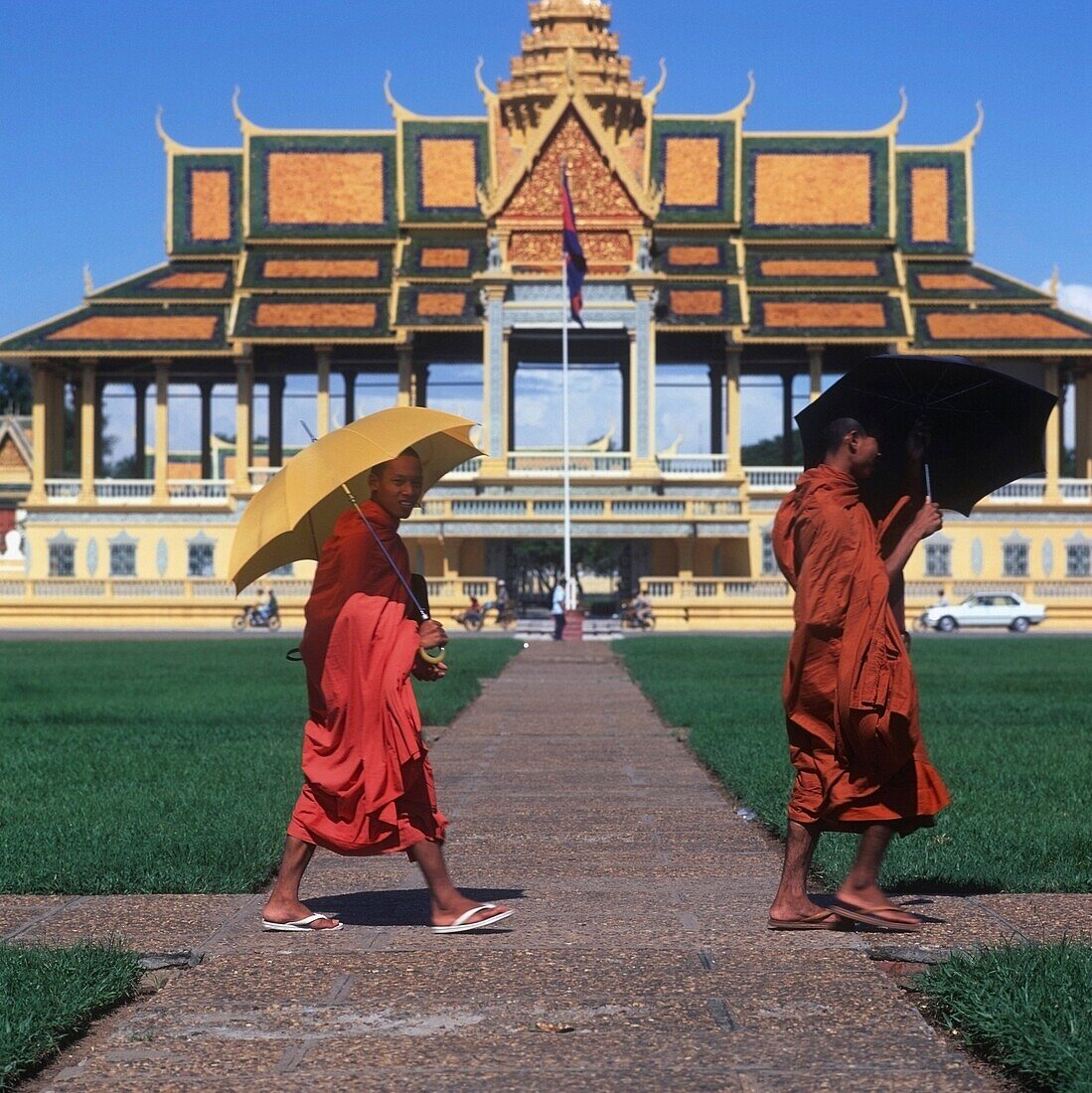 Buddhist Monks Walking Royal Palace Entrance