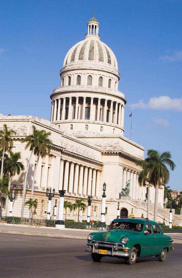 Old Car In Front Of Capitolio