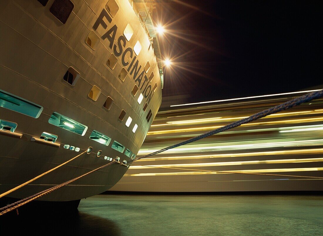 Looking Past Tied Up Cruise Ship To Another Cruise Ship Leaving Nassau Harbor, Blurred Motion
