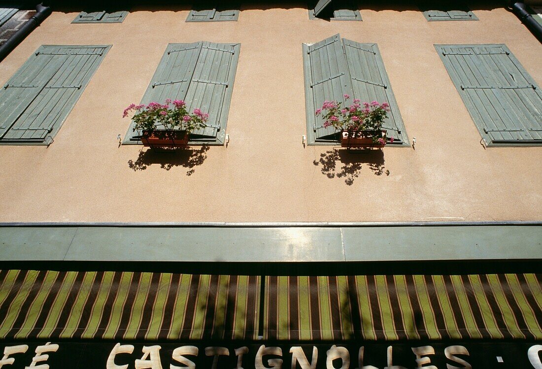 Building With Shutters, Flower Boxes And Awning, Close-Up