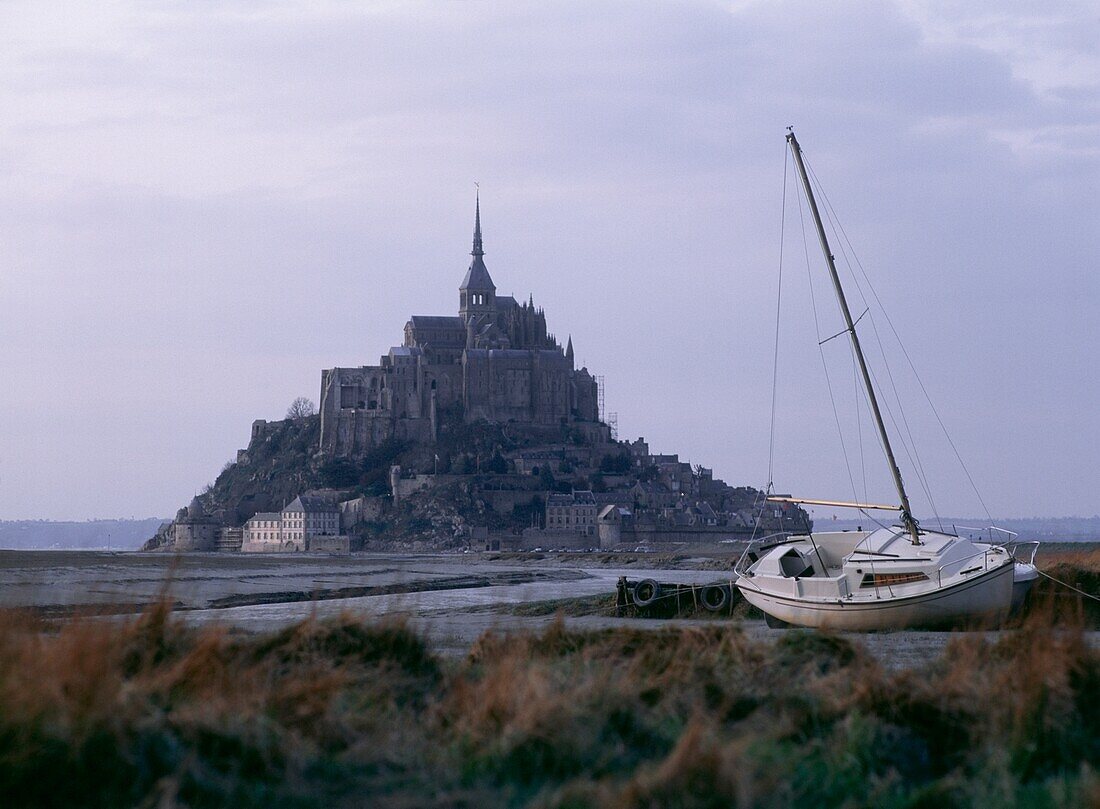 Mont Saint Michel With Sailboat In Foreground