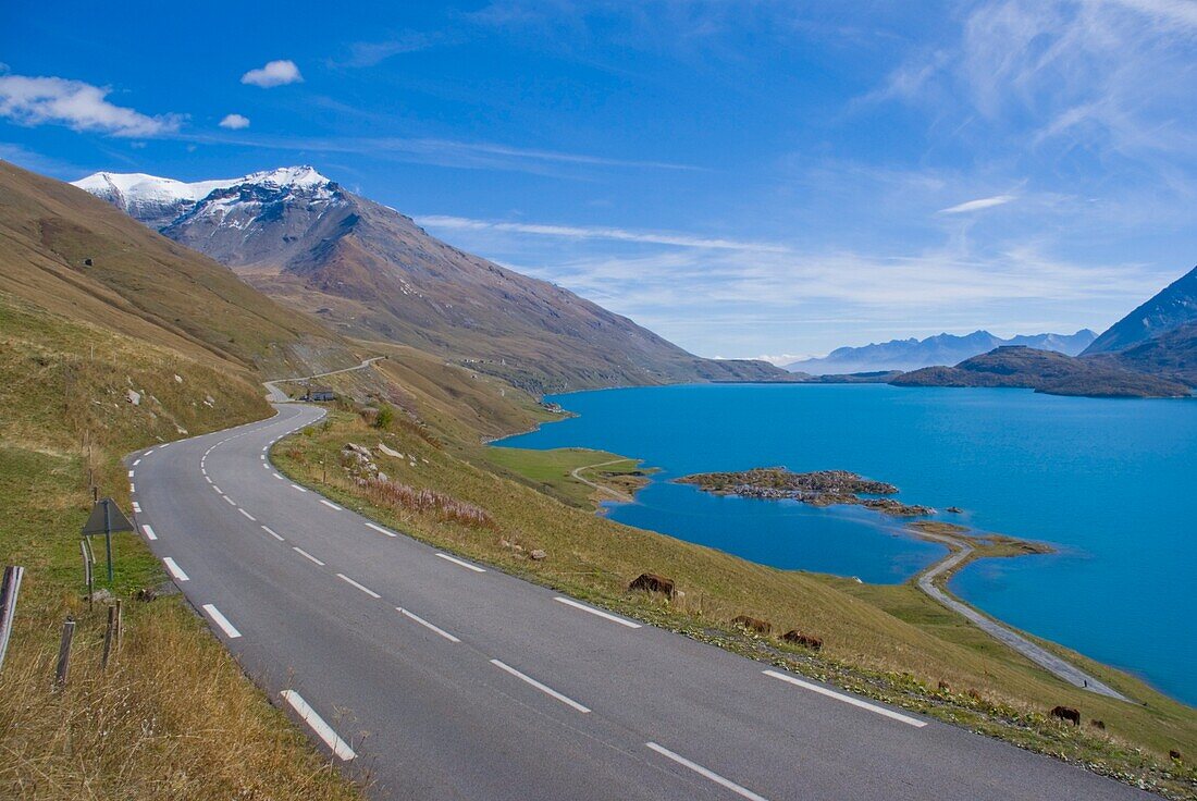 Empty Bendy Road By Lake And Mont Cenis