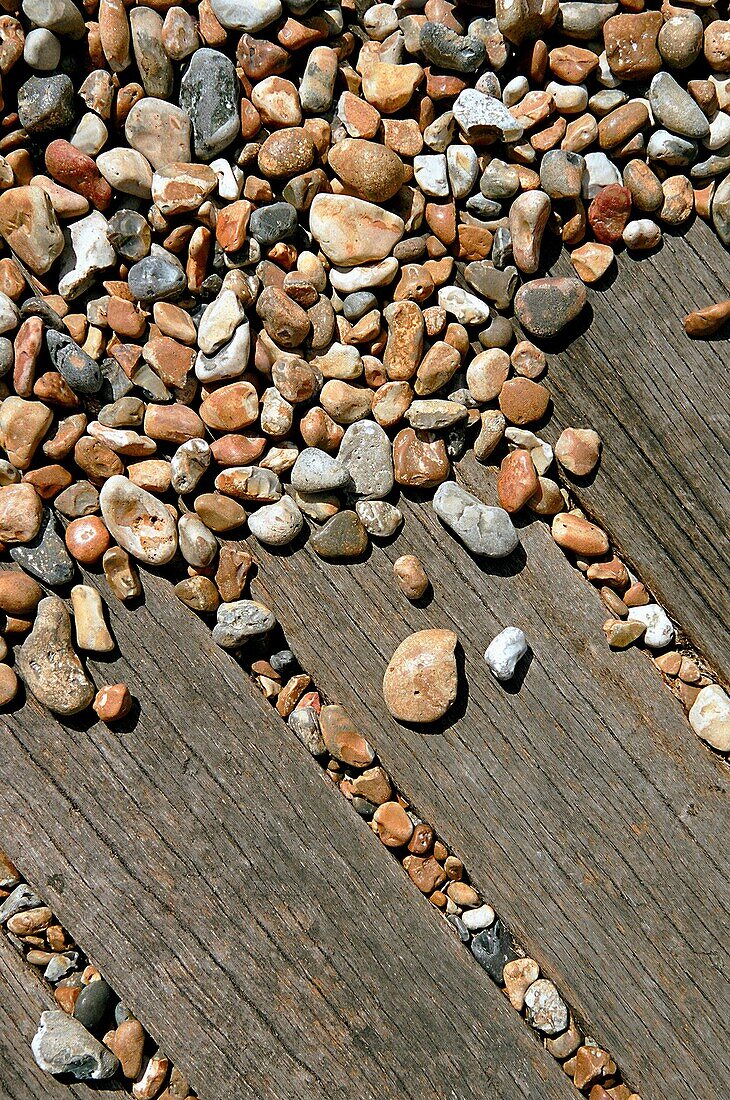 Pebbles And Wooden Boardwalk, Close Up