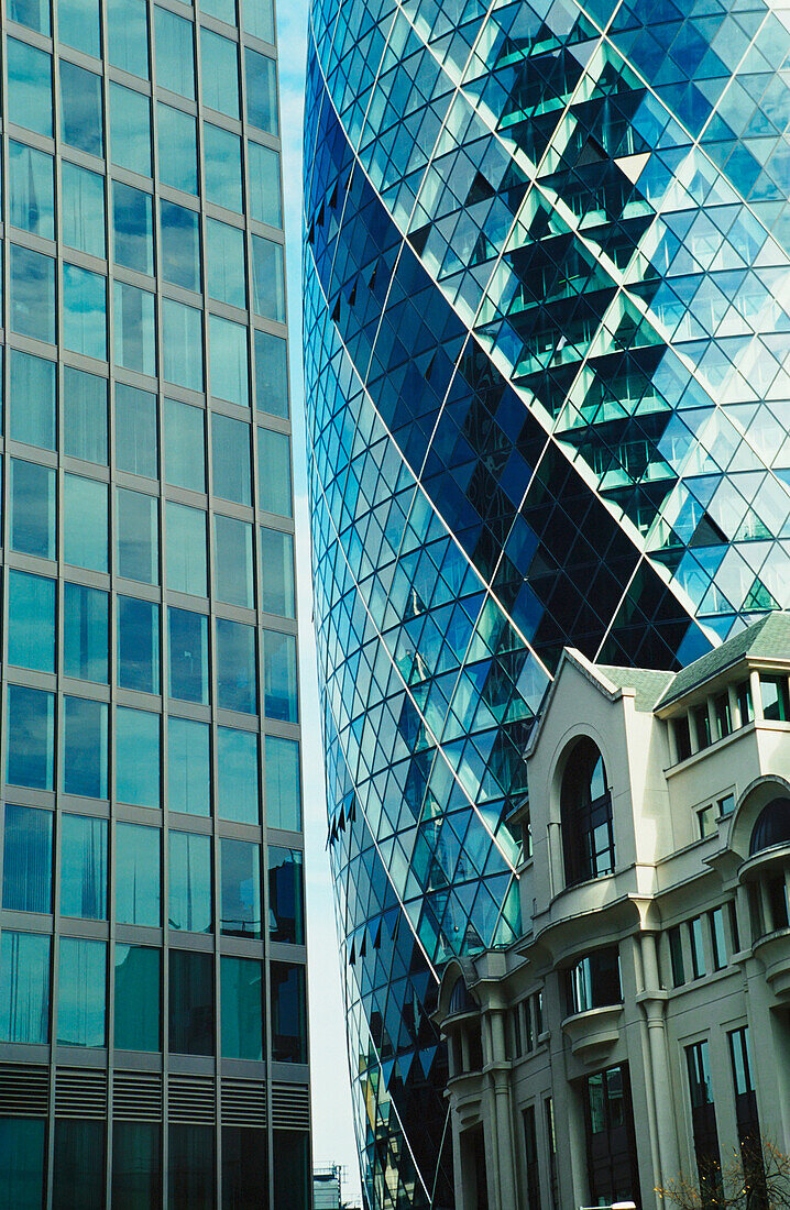 The Gherkin And Neighboring Buildings, London