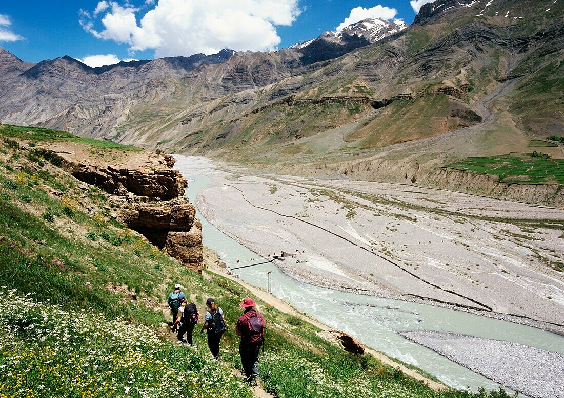 Tourists Walking Through The Himalayas