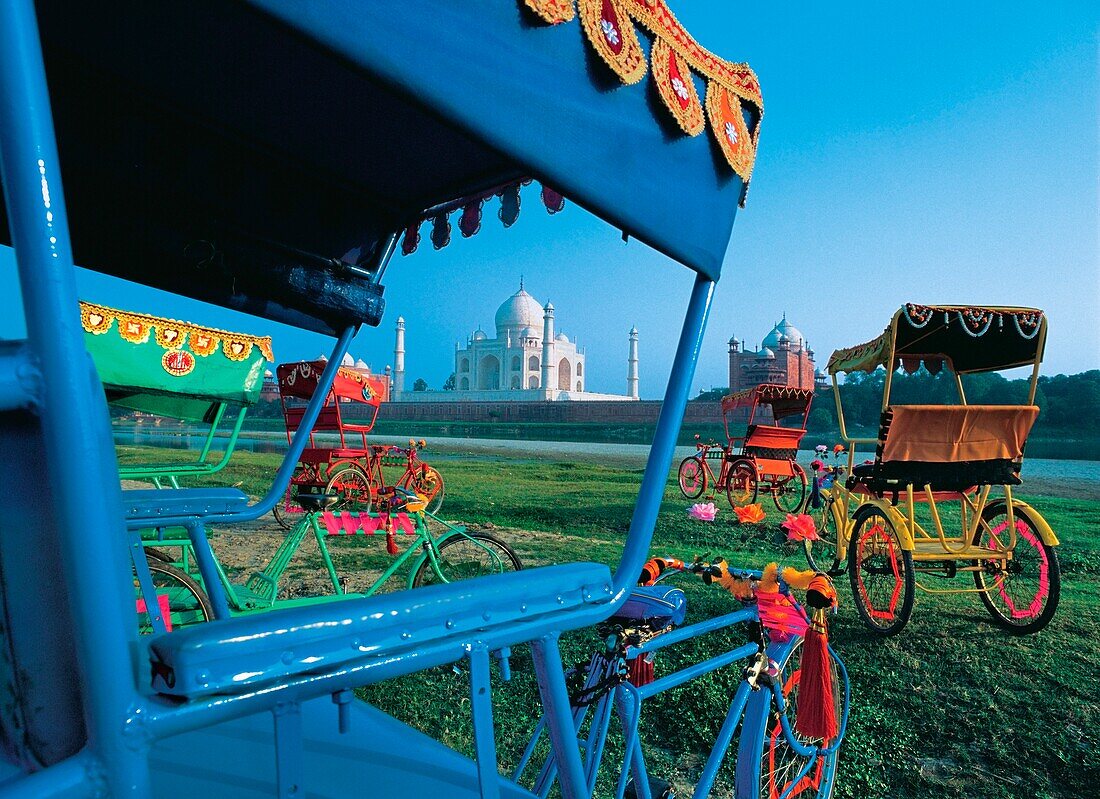 View Of Taj Mahal As Seen Through Colorful Rickshaws