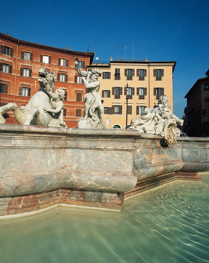 Fountain Of Neptune And Surrounding Buildings