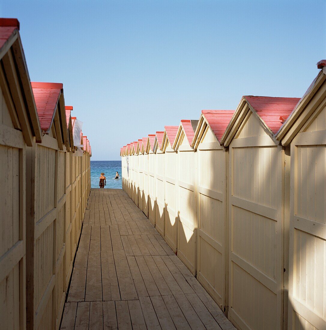 Beach Huts At Mondello Leading To The Sea, With Bathers In The Distance, Panoramic