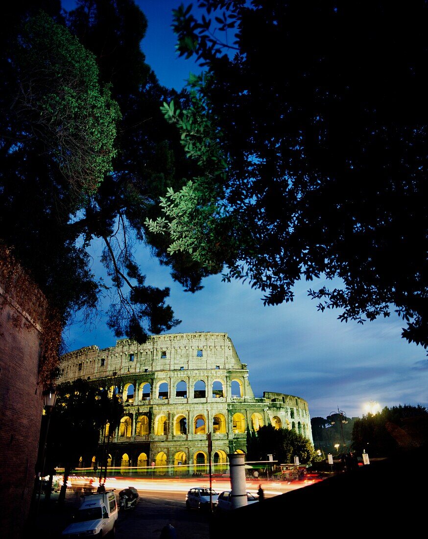Coliseum At Night With Traffic Passing, Blurred Motion