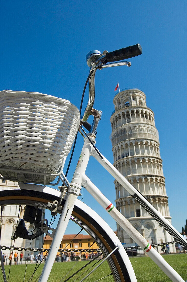 Bicycle In Front Of Tower Of Pisa