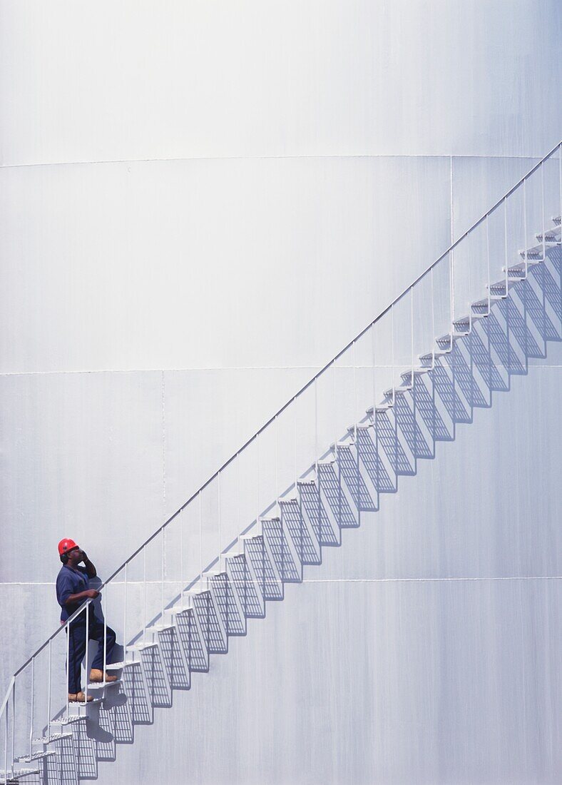 Repairman Climbing Stairs