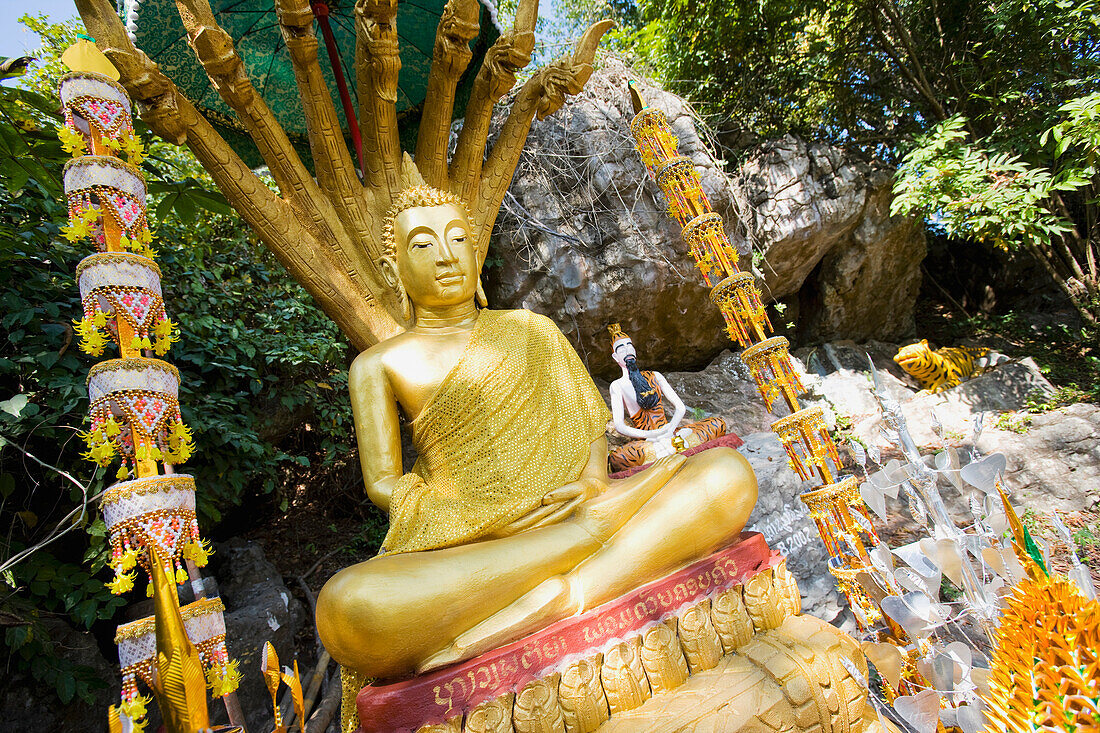 Statue Of Buddha On Phu Si Hill.